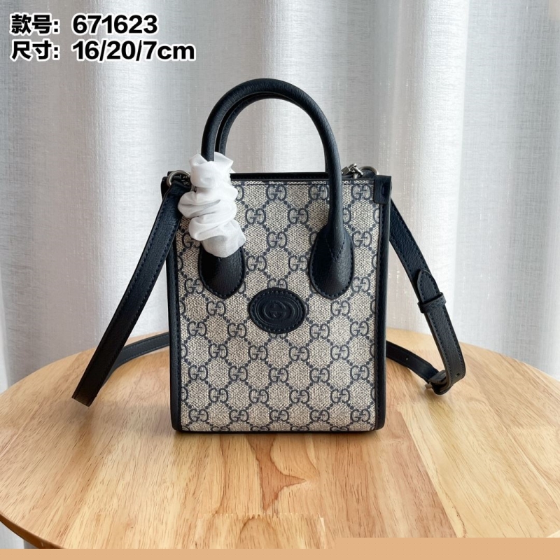 G*u*i top handle bags